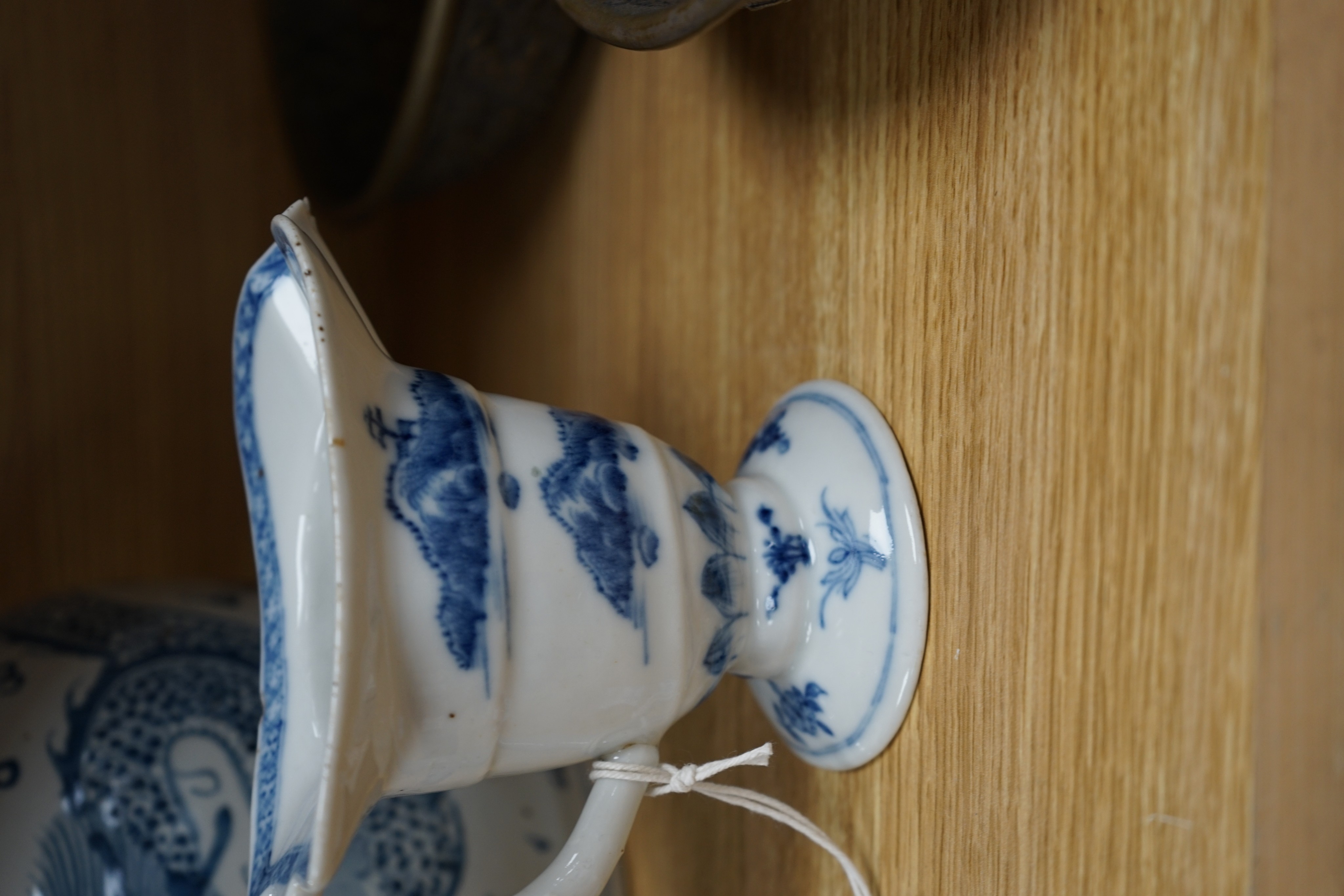 A Chinese blue and white jar, 20cm and a helmet shaped jug, 18th century and later